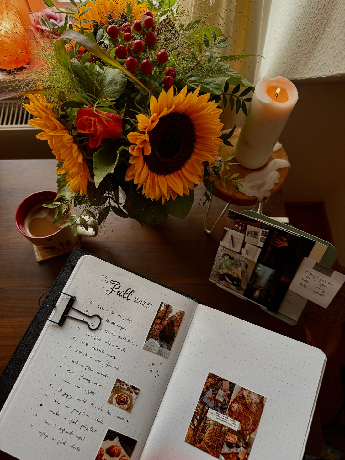 Creative fall journal with autumn bucket list items, sunflowers and pumpkin spice latte